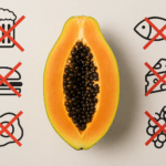 Central papaya image surrounded by six food icons marked with red X symbols to show incompatible pairings.